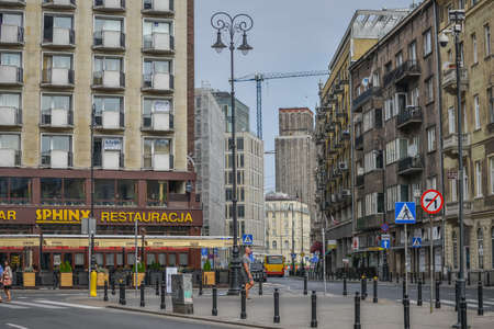 WARSAW. POLAND - AUGUST 2015: Architecture of Warsaw along city roads. Buildings along the roads. Old buildings. The crosswalk. High quality photoのeditorial素材