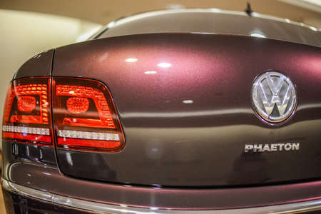 GERMANY. DRESDEN - AUGUST 2015: Taillight, taillights, Volkswagen Phaeton. Volkswagen logo....