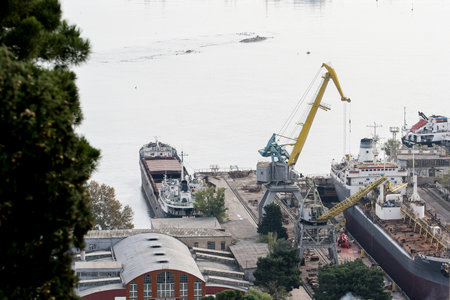 Azerbaijan, Baku - Nowember 2009: The seagoing ship is in the port. Panorama of the seaport.のeditorial素材