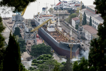 Azerbaijan, Baku - Nowember 2009: The seagoing ship is in the port. Panorama of the seaport.のeditorial素材
