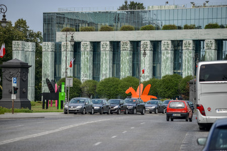 WARSAW. POLAND - August 2015: Supreme Court of Poland. The building with green columns and mirrored upper floors. Highway with a lot of cars near the building. High quality photoのeditorial素材