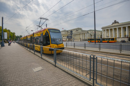 WARSAW. POLAND - AUGUST 2015: Yellow trams on the streets of Warsaw. Warm summer in Warsaw.のeditorial素材