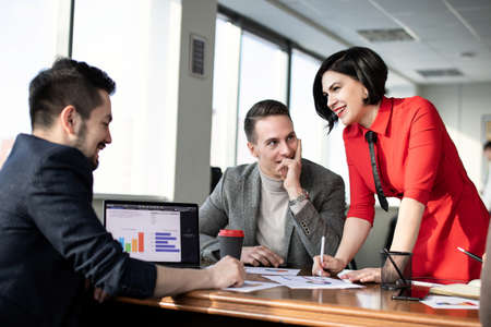 Meeting of businessmen, discussion of schedules. Business meetings, planning, negotiating.の写真素材