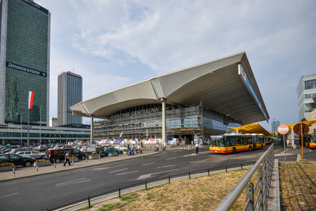 WARSAW. POLAND - AUGUST 2015: Warsaw Central Station. Railway station. Bus station. The road to the train station. Buses in the city. Skyscrapers, business center.のeditorial素材