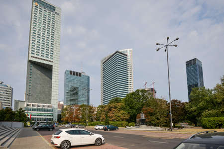 WARSAW. POLAND - AUGUST 2015: Architecture of Warsaw along city roads. Buildings along the roads. WARSAW. POLAND - August 2015: skyscrapers, business center. Road sign.のeditorial素材