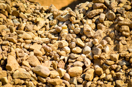 A crushed stone and a sand are materials for making asphalt. Asphalt plant.の写真素材