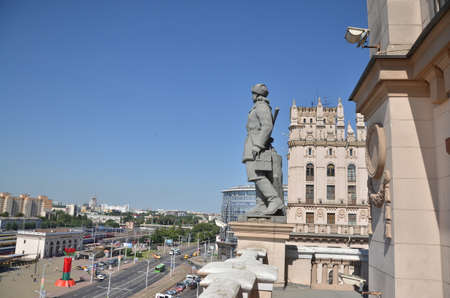 MINSK. BELARUS: 04 07 2013 - Top view of the station. A statue of a man in military uniform.のeditorial素材