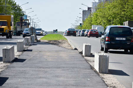 MINSK. BELARUS: 07.05.2013 - Road repair in the city, repair of tram tracks in summer.のeditorial素材
