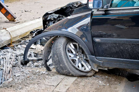 Accident, car crashed into the fence, wheel damage.