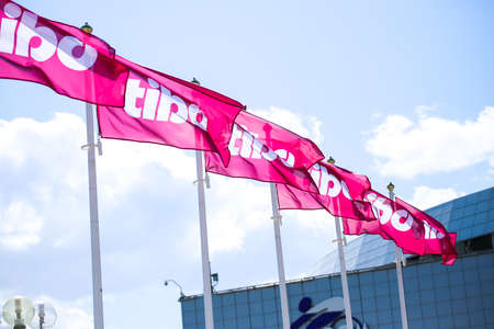 Minsk. Belarus: 06.03.2021 - Flags on the street with the logo of the Tibo exhibition in Minsk. Belarus.のeditorial素材