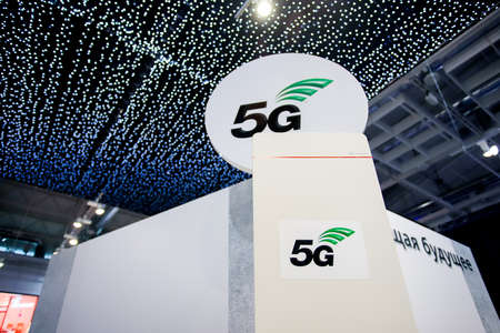 Minsk. Belarus: 01.06.2021 - 5G logo on one of the booths of the TIBO exhibition.のeditorial素材
