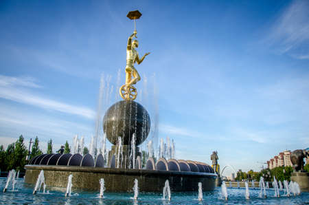 Nur-Sultan. Kazakhstan - 03.09.2013 - A fountain with a statue of gold in the center in the capital of Kazakhstan, Nur-Sultan.のeditorial素材