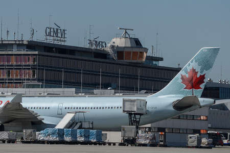 Switzerland - 05.29.2015 - Airplanes wait for departure time on a strip against the background of the sky in the cloudsのeditorial素材
