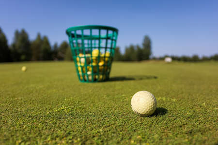 Basket of Golf Balls on the Course.の写真素材