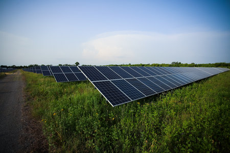 Solar panels fields on a green hills.の写真素材