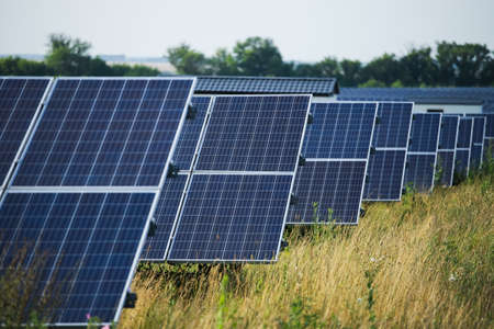 Solar cell station in the field. Natural energyの写真素材