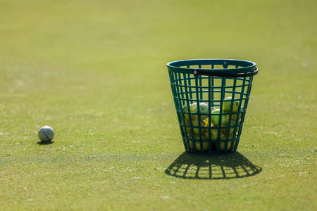 Basket of Golf Balls on the Course.の写真素材
