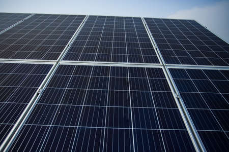 Close-up of solar panels against the sky. Natural energyの写真素材