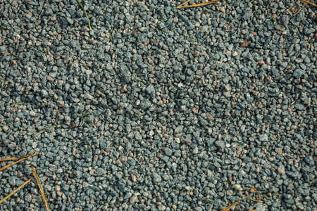 Background, small stones of gray color on a ground. High quality photoの写真素材
