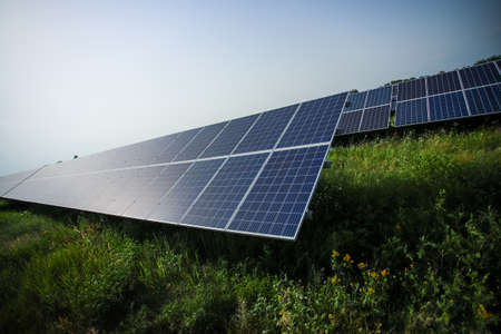 A suns rays fall beautifully on solar panelsの写真素材