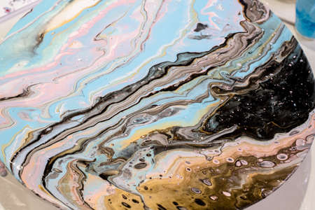 Beautiful abstract background. Golden and dark blue mixed acrylic paints. Marble texture. Contemporary art.の写真素材
