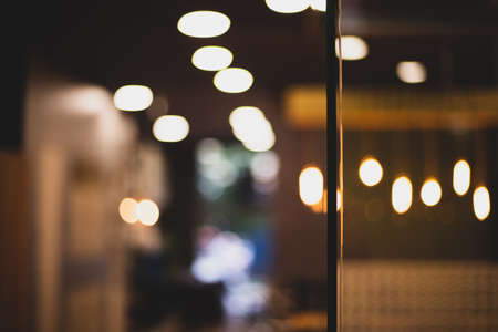 Background, lights on the brown wall of the office. High quality photoの写真素材