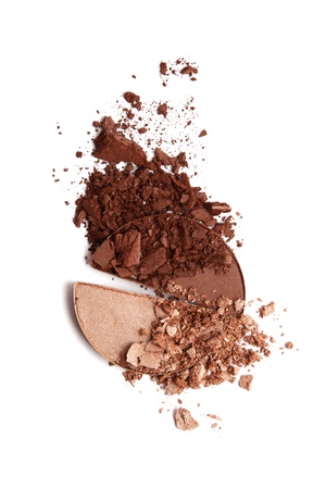Brown eye shadow crushed samples isolated on whiteの写真素材