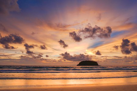 beautiful beach with twilight cloudy sky in the evening.There is an island in the sea.の写真素材