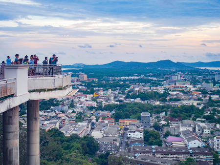 Phuket, Thailand -September 1, 2017 - This is a panoramic view on the mountain viewpoint. See the city and the sea in the distance. Many tourists are taking picture.のeditorial素材