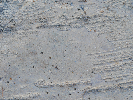 the grey rough concrete floor surface backgroundの写真素材