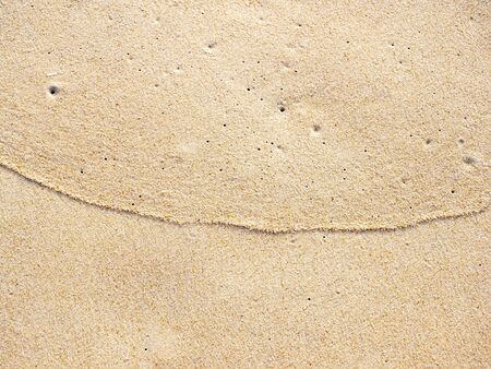 close up sand ground floor at the sea beach , background and texturedの写真素材