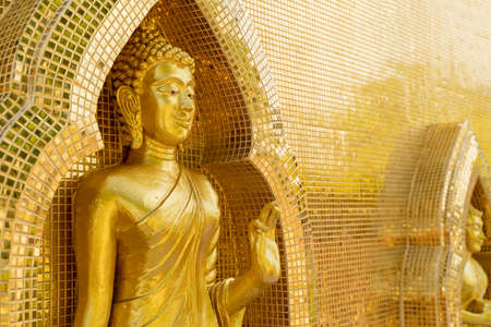 golden buddha image statue in south of Thailandの写真素材