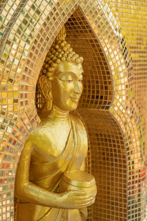 golden buddha image statue in south of Thailandの写真素材