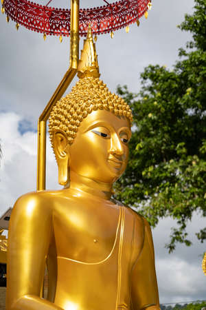 golden buddha image statue in south of Thailandの写真素材