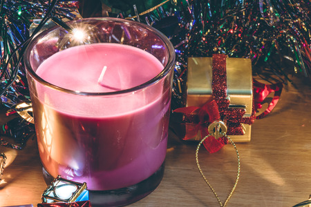 violet christmas candle and Ornament decorate Merry Christmas and happy new yearの写真素材