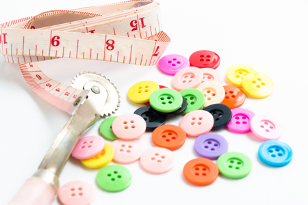 button, sew instrument isolated on white backgroundの写真素材
