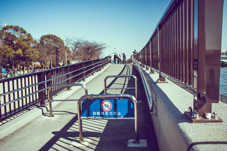 Slope and ramp for walk ar park in tokyo, do not entrance by bicycle.の写真素材