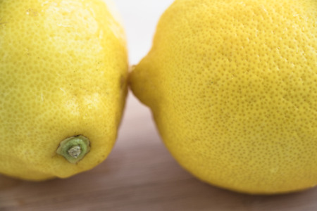 fresh lemon on the chopping block, isolate backgroundの写真素材