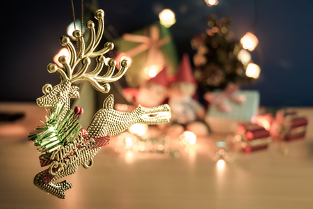 Ornament and a couple lovely teddy bear, Christmas decorate at Merry Christmas and happy new year night light. Christmas tree and other decoration with Lovely gift and ribbon .の写真素材