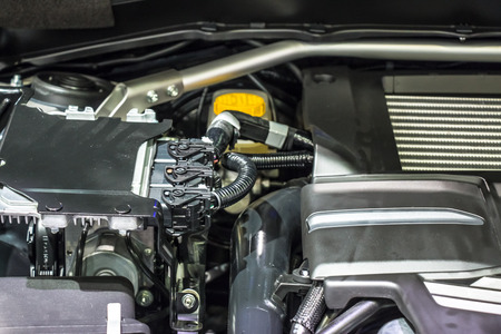 close up car engine and gear parts of automotive.