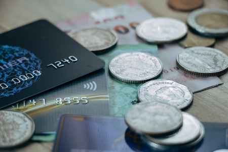 Credit card,  plastic money, put on smartphone and bank note. Electronic money and ewallet concept, new payable in Fintech era.の写真素材