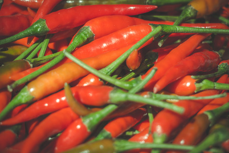 Pile of Red Chillies Background, Chilly is herb that has hot properites and  very spicy.の写真素材