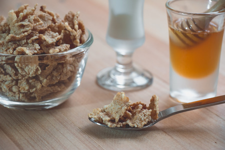 Healthy meal granola, yogurt and fruits. Delicious breakfast and snack food.with yogurt, muesli oats, nuts, honey, fruit, or other sweeteners. clean food concept.の写真素材