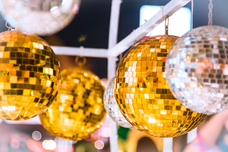Christmas tree decorated with mirror disco ball. Ornament lighting and gliter decor for celebrate, merry christmas and Happy new year.の写真素材