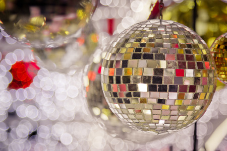 Christmas tree decorated with mirror disco ball. Ornament lighting and gliter decor for celebrate, merry christmas and Happy new year.の写真素材