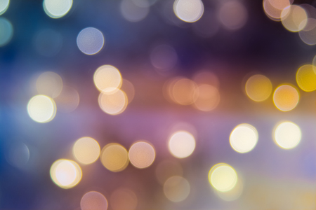 Blurred abstract light of luxury lamp at night for party or celebration background.Christmas tree decorated with mirror disco ballの写真素材