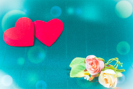 2 hearts and sweet roses with green background, valentine day  conceptの写真素材