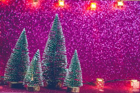 Christmas tree and ornament, light up glitter background. Merry christmas and happy new year night.の写真素材