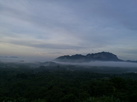 Morning Mist and fog over the mountains.の写真素材