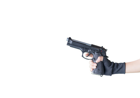 Hand gun isolated Caution On the sky backgroundの写真素材